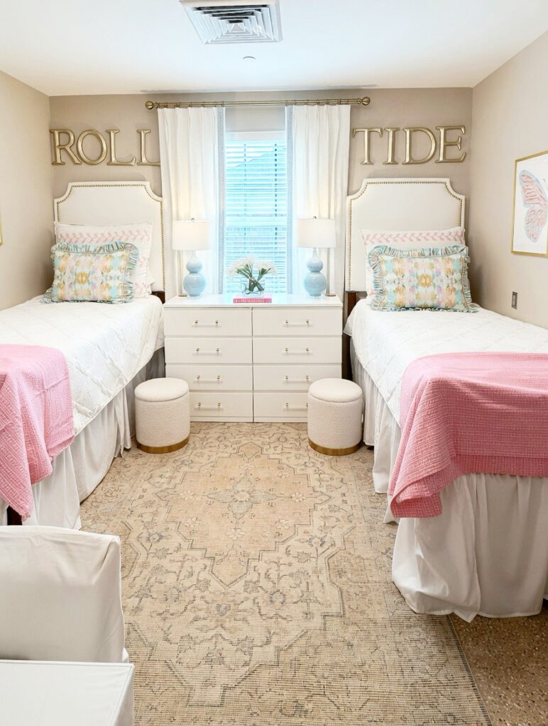 preppy pink and gold symmetrical dorm room