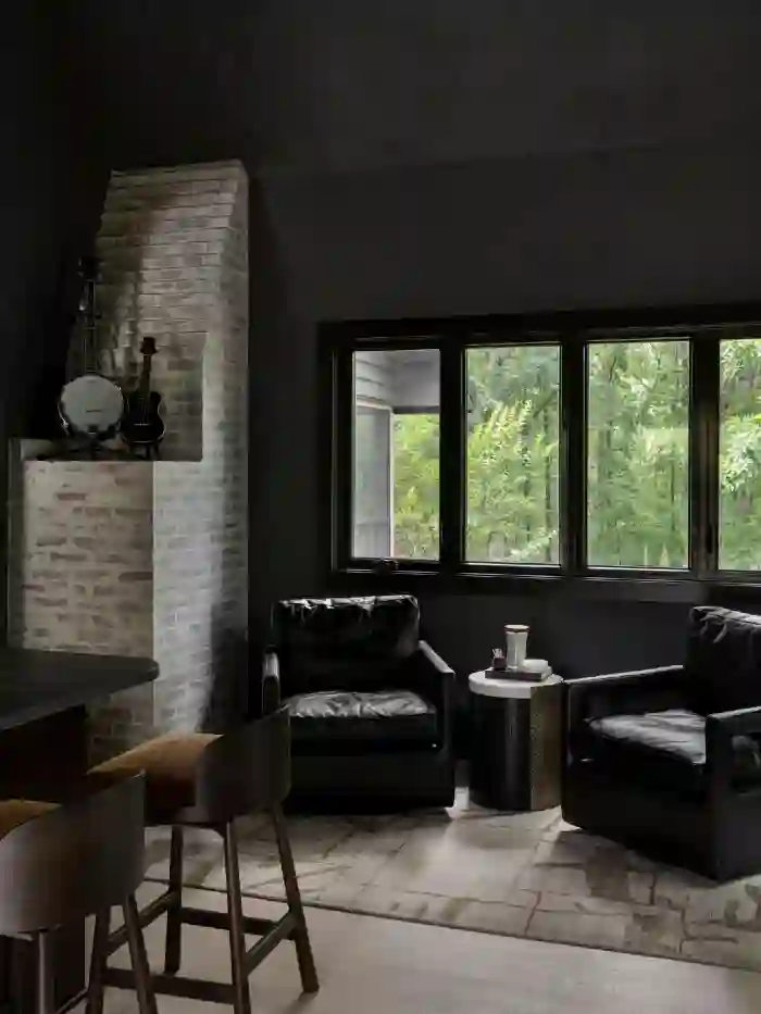 polished charcoal and leather tasting room